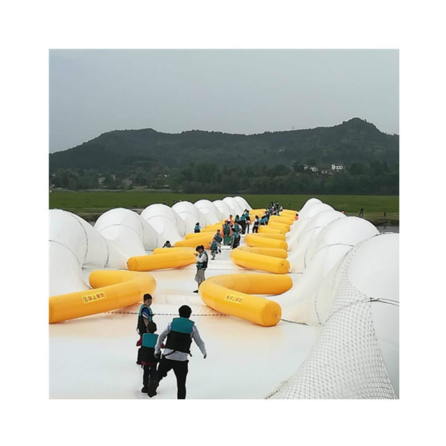 海南蹦床桥农庄游乐场景区新的项目新款充气蹦床桥制作厂家热门